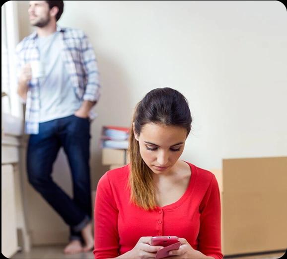 Two friends surprised while looking at a laptop